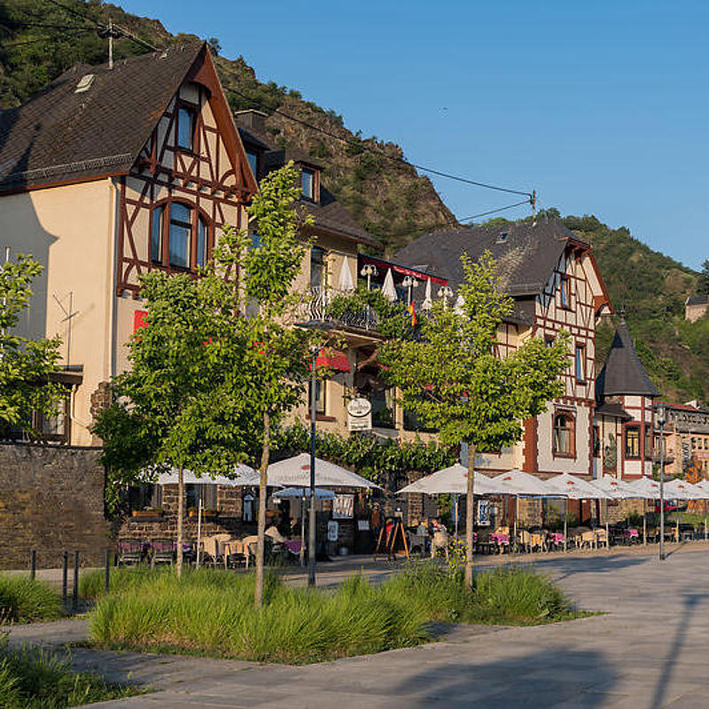 An old village center with half‑timbered houses and restaurants.